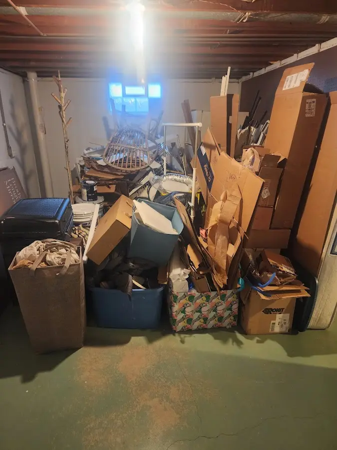 Roll-off dumpster container at job site for Cleanout Dumpster Rental in Wood River